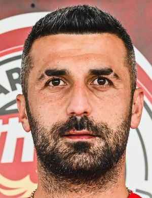 E. Sayar