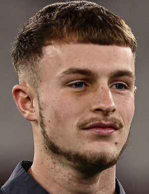Maxwell Kinsey Wellings profil resmi
